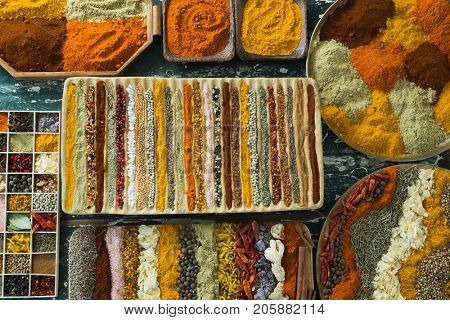 Overhead of various spices arranged in tray