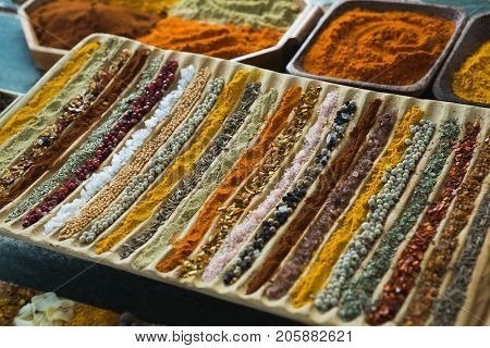 Close-up of various spices arranged in tray