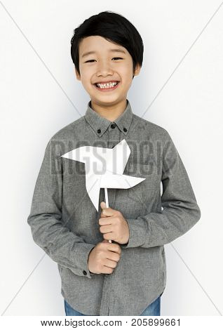Little Boy Hands Holding Paper Wind Mill Studio Portrait