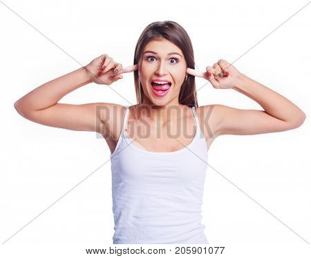crazy young  woman showing toungue wearing jeans against white studio background