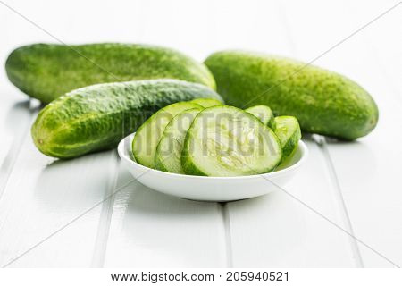Sliced green cucumbers. Cucumbers in bowl.