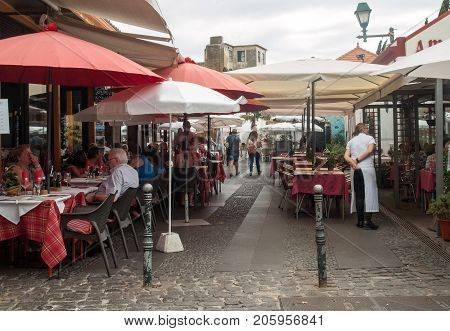 FUNCHALMADEIRA PORTUGAL SEPTEMBER 4 2016: Zone Velha - the oldest district famous for its best restaurants and cafes in Funchal. Madeira Portugal