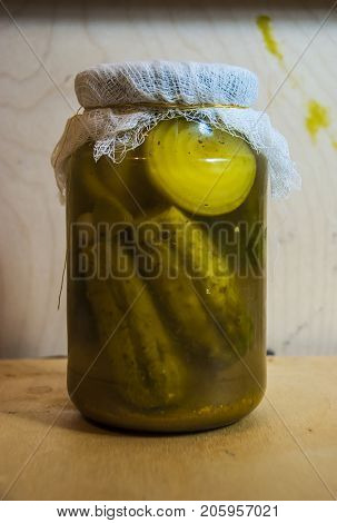Assortie Jars Of Marinated Vegetables Picles Tomato On Wooden Background