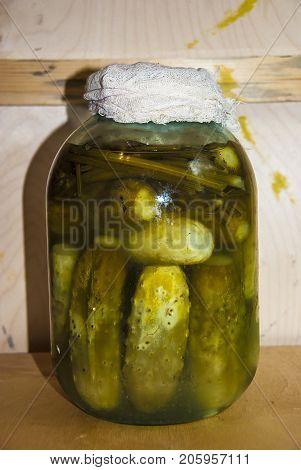 Assortie Jars Of Marinated Vegetables Picles Tomato On Wooden Background