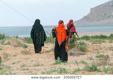 Women Dressed In The Burqa On The Countryside Of Socotra