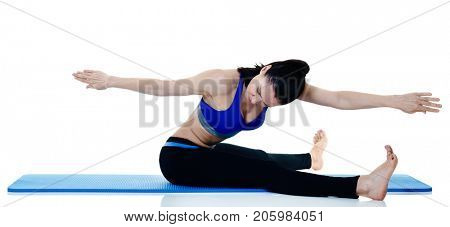 one caucasian woman exercising fitness pilates exercices isolated on white background