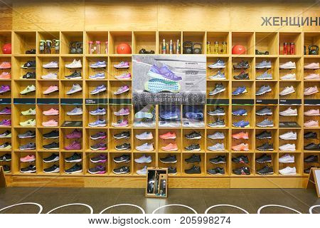 SAINT PETERSBURG, RUSSIA - CIRCA AUGUST, 2017: inside Reebok store at Galeria shopping center. Reebok is a global athletic footwear and apparel company.