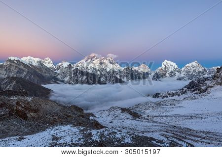 Sunset Over Everest Mountain With Unbelievable Sky Gradient From Blue To Pink And Violet, View From