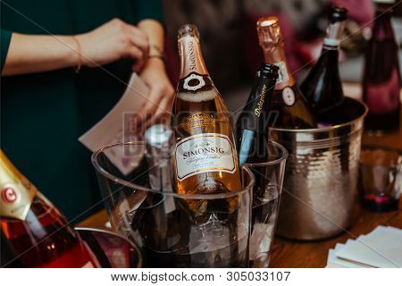 Moscow, Russia-march 30, 2019: Wine Tasting: On A Wooden Table There Are Silver Buckets For Cooling 