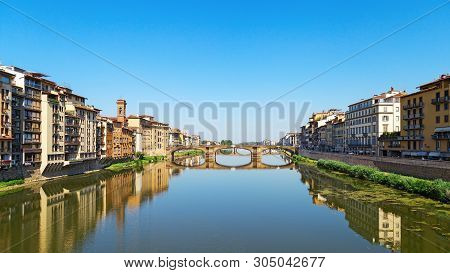 Bridge Over River Arno In City Florence Is Called Trinity. Stone Bridge Of Florence, Italy, June 201
