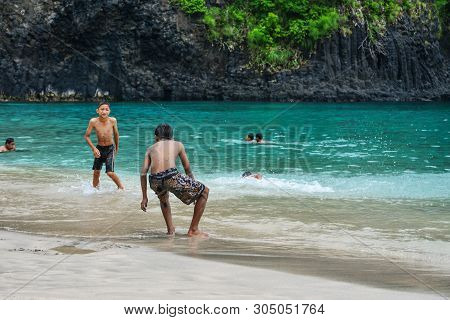 Bali, Indonesia - January 14, 2018: Kids Playing At Tropical Beach In Bali Near Chandidasa, Knowen A