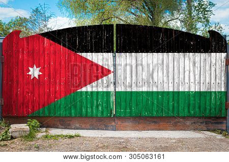 Close-up Of The National Flag Of Jordan On A Wooden Gate At The Entrance To The Closed Territory On 