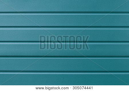 Turquoise Metallic Striped Surface. Metalline Wall Siding, Cladding. Abstract Green Striated Backgro