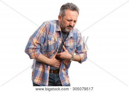 Man Having Gastric Health Problems Touching Stomach With Nauseous Expression Wearing Casual Clothes 