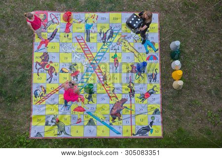 City Riga, Latvian Republic. Girls Play An Outdoor Game That Helps To Unite Large Groups Of People.
