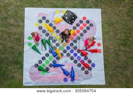 City Riga, Latvian Republic. Girls Play An Outdoor Game That Helps To Unite Large Groups Of People.
