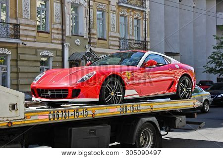 Kiev, Ukraine, July 13, 2015. Ferrari 599 Alonso Edition 60f1. Car On A Tow Truck