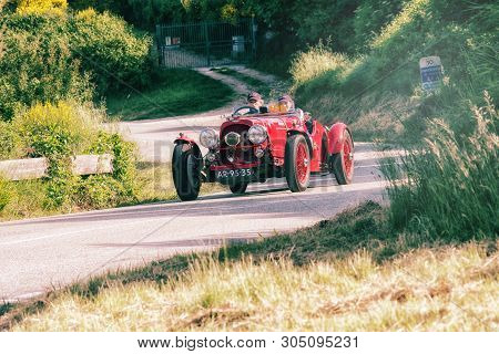 Pesaro Colle San Bartolo , Italy - May 17 - 2018 : Aston Martin 2 Litre Speed Model 1936 On An Old R