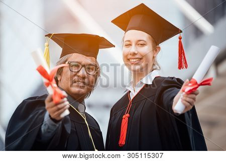 Happy Woman On Her Graduation Day University. Education And People.