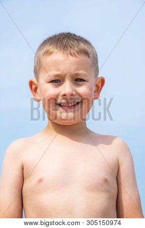 Boy On The Beach