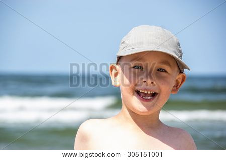 Boy On The Beach