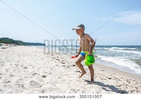 Boy On The Beach