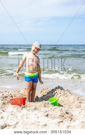 Boy On The Beach