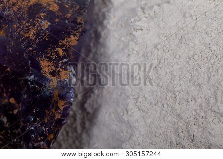 A Pile Of Fluorine Spar Surrounded By Fluorite Stones.