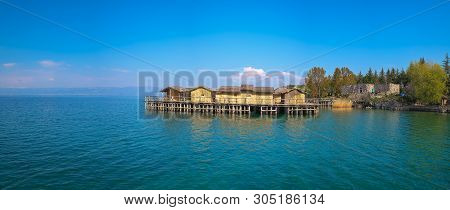 Panoramic View Of The Wooden Pier Leading To The Bay Of The Bones Museum On Water, Authentic Reconst