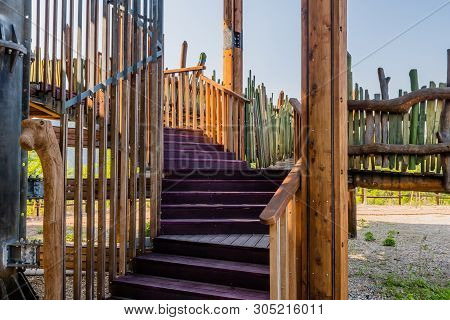 Wooden Support Columns And Stairway Going Up To Observation Deck Of Tower In Mountainside Public Par