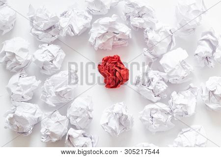 Social Pressure Concept. Flat Lay Of Crumpled Same Color Paper Ball Crowd Around Individual Red One.