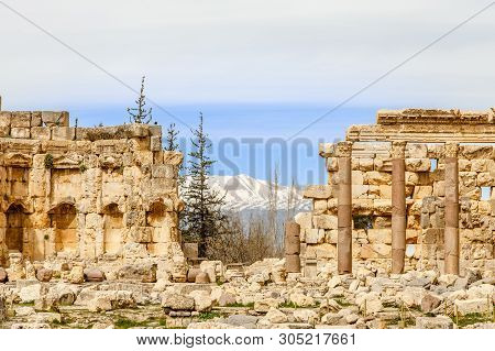 Columns Of Ancient Roman Temple Of Jupiter With Mountains In The Background, Bekaa Valley, Baalbek, 