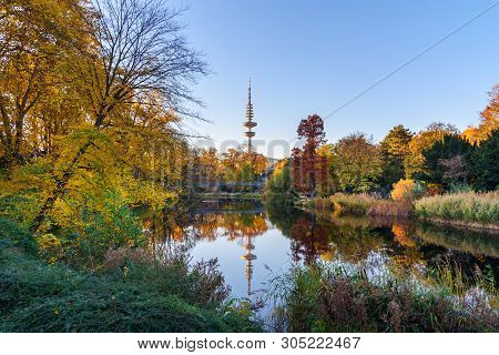 City Park Planten Un Blomen At Autumn. View Of Heinrich Hertz Tower Is Radio Telecommunication Tower