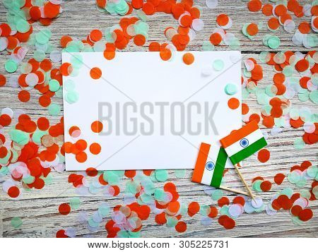 India Independence Day 15 August, Two Mini India Flags With Two Sheets Of White Paper, With Confetti