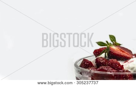 Red Ripe Sweet Strawberries With Ice Cream In A Ice-cream Bowl On A White Background