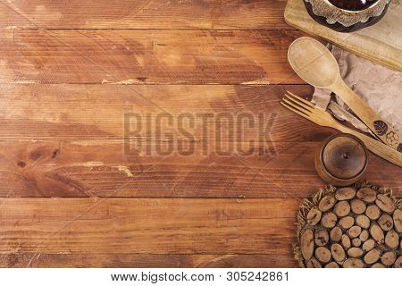 Wooden Kitchen Equipment On A Dark Wooden Background. View From Above