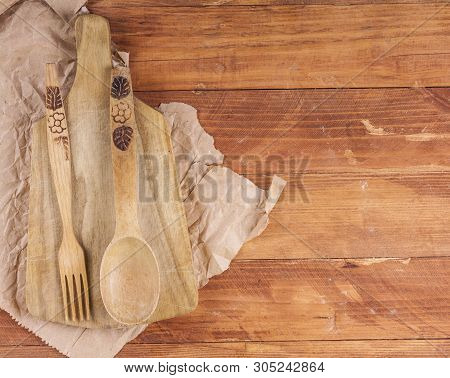 Wooden Kitchen Equipment On A Dark Wooden Background. View From Above