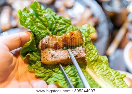 Pan-fried Cooked Black Pork Meal In Korea Restaurant, Fresh Delicious Korean Food Cuisine On Iron Pl