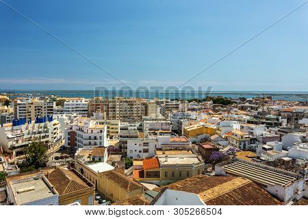Aerial. The Southern City Of Portugal Faro View From The Top.