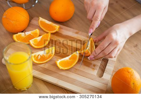 Cooking, Food And Concept Of Veganism, Vigor And Healthy Eating - Close Up Of Female Hand Cutting Or