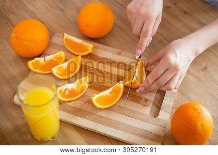 Cooking, Food And Concept Of Veganism, Vigor And Healthy Eating - Close Up Of Female Hand Cutting Or