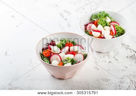 Salad From Iceberg Lettuce, Kale And Radiccio, Cherry Tomatoes, Radish, Mini Mozzarella And Pumpkin 