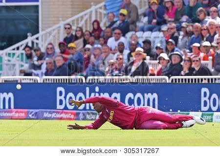 NOTTINGHAM, ENGLAND. 06 JUNE 2019: Sheldon Cottrell of West Indies slips whilst fielding  during the Australia against West Indies, ICC Cricket World Cup match, at Trent Bridge, Nottingham, England.