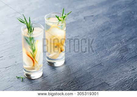 Summer Drinks, Rosemary Pear Cocktails With Ice N Glasses. Refreshing Summer Homemade Alcoholic Or N