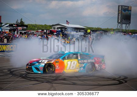 June 02, 2019 - Long Pond, Pennsylvania, USA: Kyle Busch (18) wins the Pocono 400 at Pocono Raceway in Long Pond, Pennsylvania.