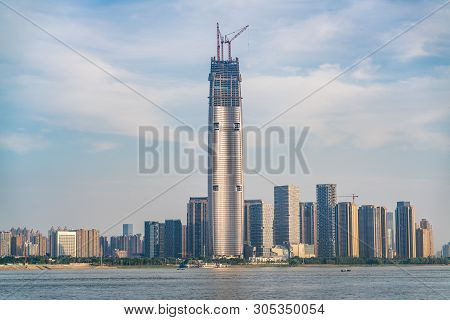 Wuhan Skyline And Yangtze River With Supertall Skyscraper Under Construction In 2019 In Wuhan Hubei 
