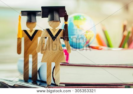 America Education Knowledge Learning Study Abroad International Ideas. People Sign Wood With Graduat
