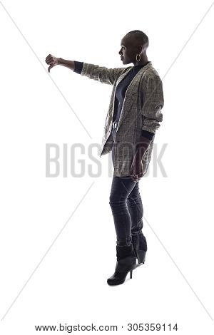Black Female African American Model On A White Background.  She Is Holding Thumbs Down In Disapprova