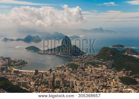 Rio De Janeiro, Sugar Loaf, Brazil: Mountain Resembling Inverted Funnel Behind Urca Hill. Tourist Si