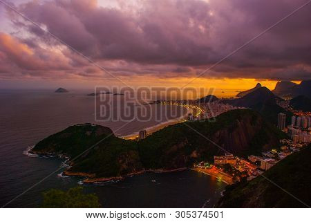 Night View Of Copacabana Beach, Urca And Botafogo From Sugar Loaf In Rio De Janeiro